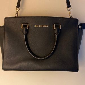Michael Kors bag with strap. Barely used!